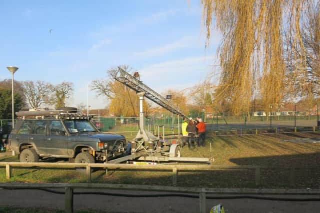 ARISS engineers setting up the radio antenna before the link-up
