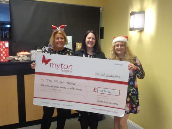 Louise Sheepy, deputy general manager of Kenilworth Holiday Inn (centre), with community fundraisers for Myton Hospice Louise Careless (left) and Rachel Stevens (right).