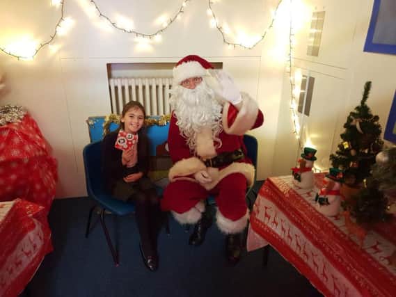Warwick Castle made sure  Santa  could make it to Westgate Primary School's Christmas Fair on Monday.