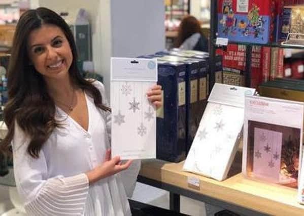 Kristina Salceanu with her Advent for Chnage calendars. NNL-181227-093051001