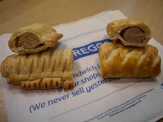 Left: The vegan sausage roll with what look like pastry molars protruding from its side. Right: The golden-brown 'real meat' roll that could not beat the vegan offering.