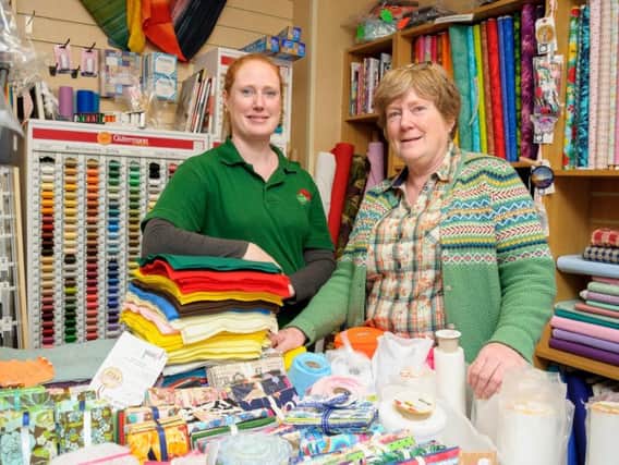Leanne Hickman (left) and her mother Di Carter (right), are looking for a lover of sewing and knitting to take over their shop
