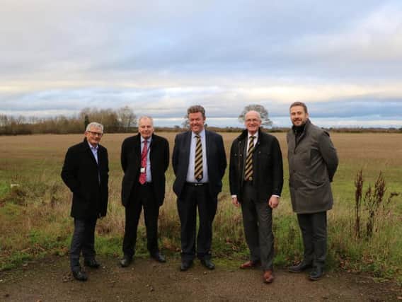Anthony Riley from  Waterloo Housing, Chris Elliott from Warwick District Council, Russell Davis director at Leamington FC, Jim Scott Leamington FCs Chairman, and Steve Smith from Warwickshire County Council. Photo supplied by Waterloo Housing.