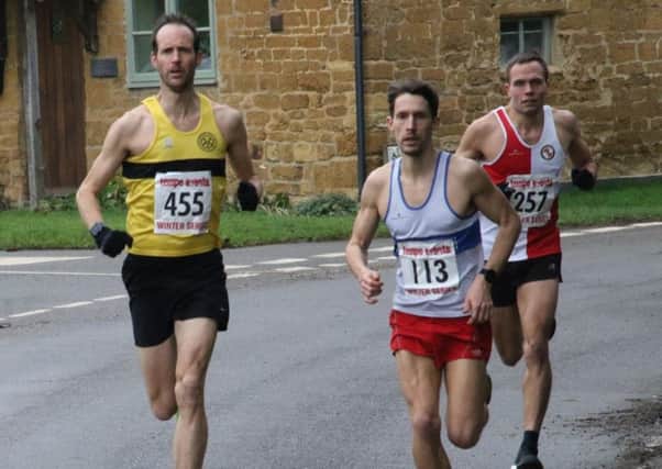 Paul Andrew battles it out with Richard Shephard in the early stages of the Ilmington 10k. Picture: Barry Cornelius (www.oxonraces.com)
