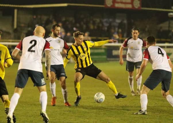 Connor Taylor works hard to hold on to possession for Leamington. Pictures: Tim Nunan
