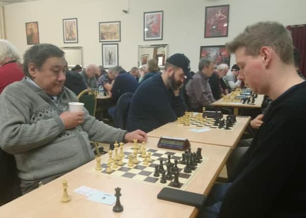Rugby Chess Clubs Jamie Kearney ( pictured on the right) playing Grand Master Mark Hebden at the Coventry & District Centenary Rapidplay at the Massey Ferguson Club in Coventry