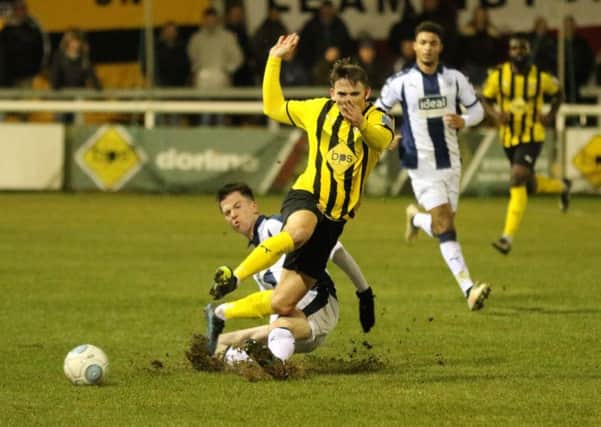 Connor Taylor is sent crashing to the turf in midweek, forcing his early departure. Picture: Tim Nunan