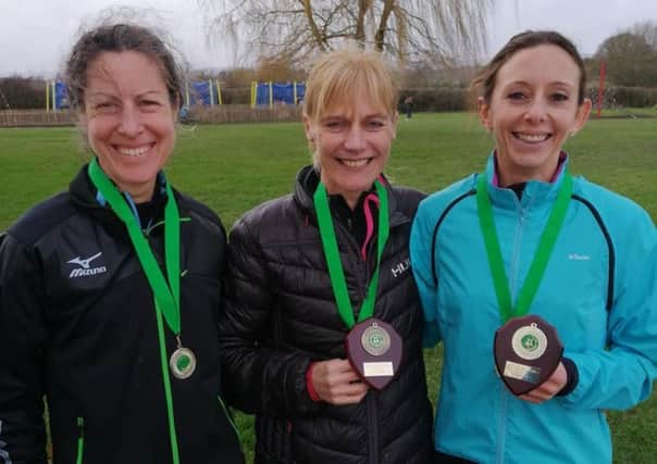 Leamington C&AC's victorious masters' team of Sue Harrison, Jenny Jeeves and individual gold winner Kelly Edwards.