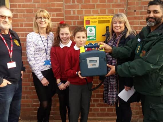 Left to right: Roy Shearing (Kenilworth Rotary Club), Mrs Louise Mohacsi (Headteacher at St Nicholas C of E Primary School), pupils Matilda and Tom, Jane Hunt (School Office) and Bobby Qayum. Photo submitted.