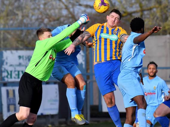 Goalkeeper Matt Hill punches clear in last weekend's 7-1 win over Wellingborough