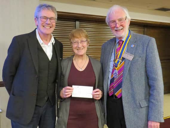 Stuart and Jackie Potter with David Smith, Rotary president