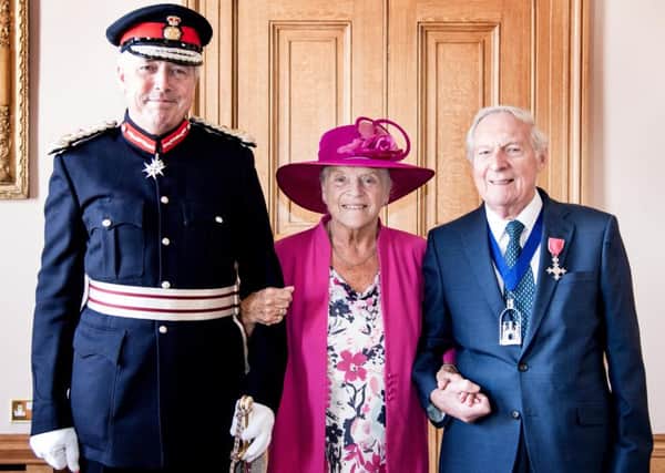 Cllr Gerry Guest and his wife Audrey with  the Lord Lieutenant of Warwickshire Timothy Cox. Photo by Gill Fletcher.