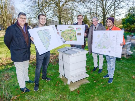 Pictured at the apiary, from left to right, are Mike Roberts, Ian Burns, Jack Llewellyn, George Brown (BBKA) and Anish Mistry.