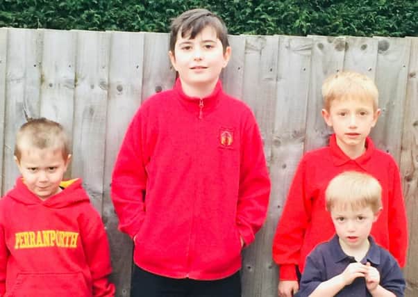 Baginton brothers Mason and Thomas (left and centre) and brothers Ben and James (right) are from families who would be affected by the changes to the free school bus service provision for the village.