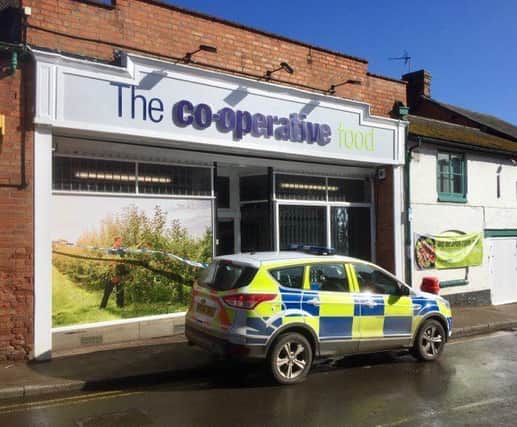 Police outside the Co-op.
