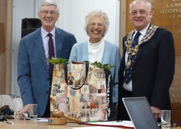 Tony Jones, Sheila Skinner and Cllr Michael Hitchins after the presentation of a rhododendron plant to Sheila.