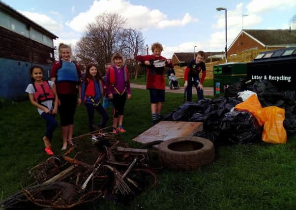 Members of the 2nd Warwick Sea Scouts at a previous clean-up event. Photo submitted.