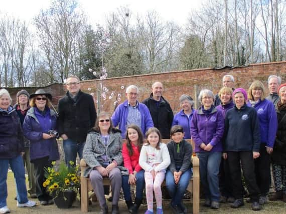 The installation of the bench at Guy's Cliffe Walled Garden. Photo submitted.