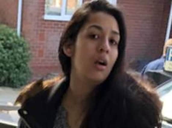 Police would like to speak to this woman in connection with a theft in Warwick. Photo supplied by Warwickshire Police.