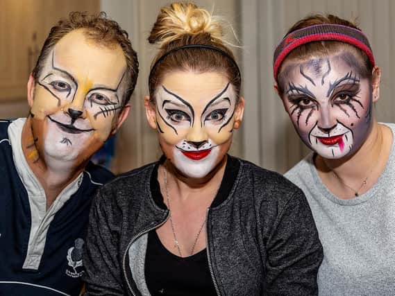 John Booth, Nikki Claire Cross and Vicky Holding prepare for Cats at the Spa Centre in Leamington