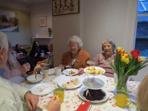 Making friends at Contact the Elderly tea parties