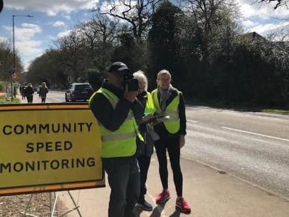 Residents taking part in the Community Speed Monitoring scheme on Banbury Road. Photo submitted.