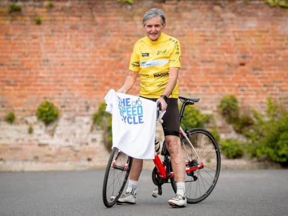 John Murphy will be cycling more than 200 miles for charity.