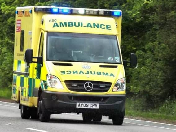 A woman was taken to hospital after being hit by a lorry on the M40.