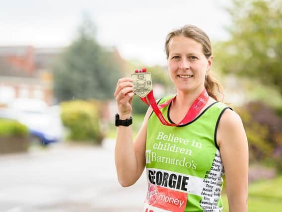 Georgie Acton with her London Marathon medal.