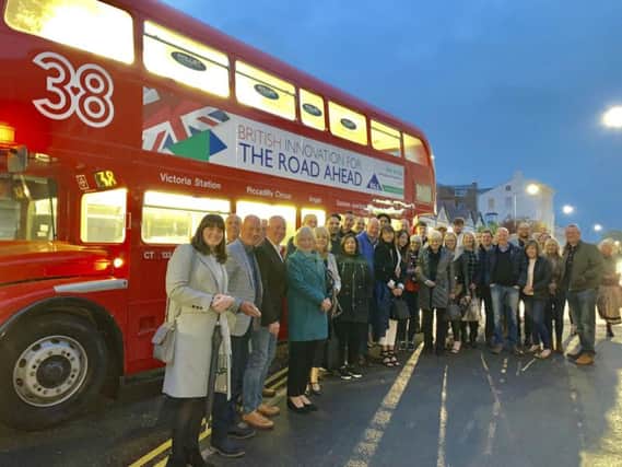 Acorn Fundraisers get a lift of the PGS double decker bus.