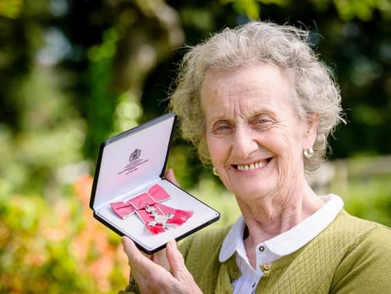 Viv Morgan with her MBE.