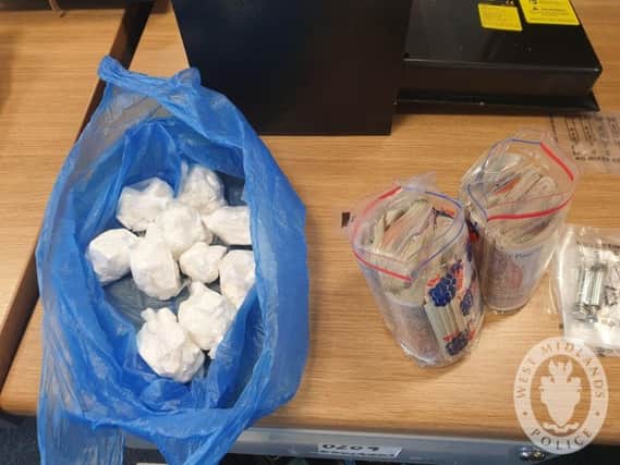 Some of the drugs and money seized during the raids in Coventry. Photo by West Midlands Police.