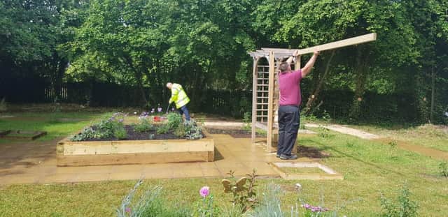 Work taking place at the sensory garden at Heart of England Mencap's day centre in Leamington