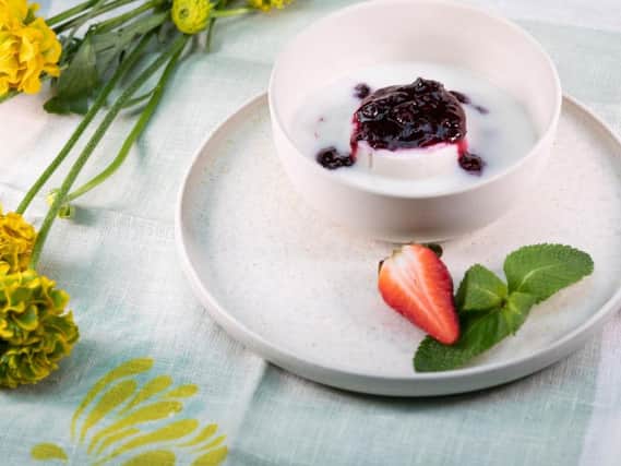 Coconut pudding with berry compote