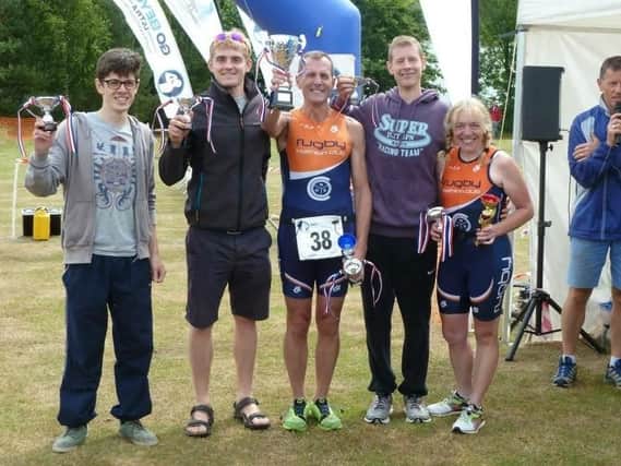 Kate Vanloo (right) with members of Rugby Triathlon Club