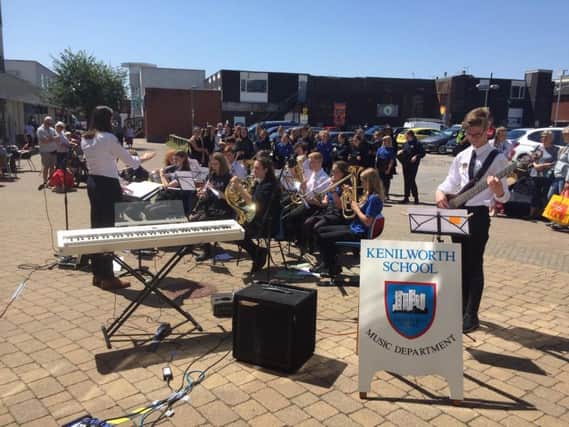 Students from the music department at Kenilworth School perform a free concert at Talisman Square