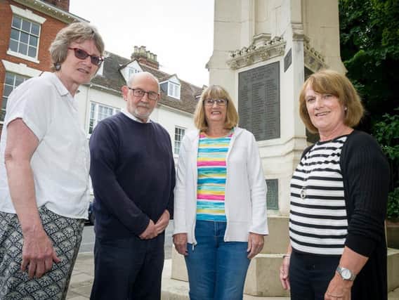 Left to right, Tricia Scott, Rick Thompson, Christine Shaw and Helen Fellows next to the towns war memorial.