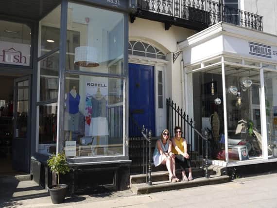 Debra Whitaker and Eleni Bradshaw in between their two shops in Warwick Street. Photo by Amanda Stacey.