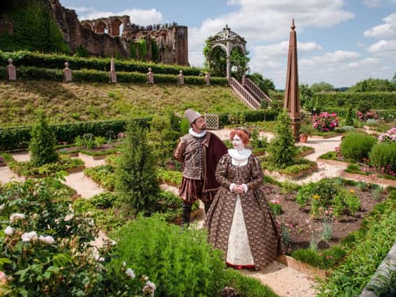 Queen Elizabeth I and Robert Dudley on the grounds of the Elizabethan Gardens