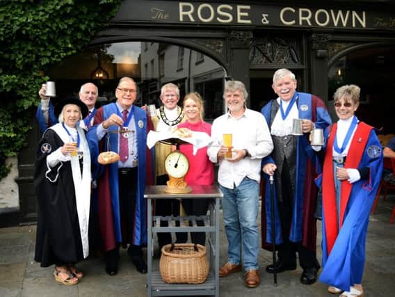 Gail Warrington, past Bread Weigher and current Low Bailiff of Warwick Court Leet, Alan Lettis, Organiser of Warwick Beer, cider and music festival and Juror of Warwick Court Leet, Roy Glassborow, current Bread Weigher, John Atkinson, Bailiff of Warwick Court Leet, Katie Middleton, Landlady of the Rose &Crown, Andy Sylvester, marketing writer and volunteer researcher, Graham Sutherland, Ale Taster of Warwick Court Leet and Mo Sutherland, past Bailiff of Warwick Court Leet. Photo by Gill Fletcher