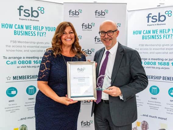 Sandra Garlick, FSB Area Lead for Warwickshire and Coventry presenting the award to Matt Western MP for Warwick and Leamington