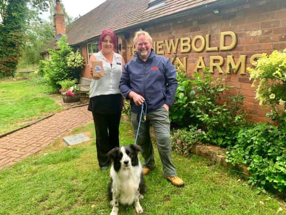 Karen Douglas, manager of the Newbold Comyn (left), Boarder Collie, Zack (centre) and Wayne Mclanaghan, Oscar Pet Foods nutritional advisor for Leamington and Warwick (right)