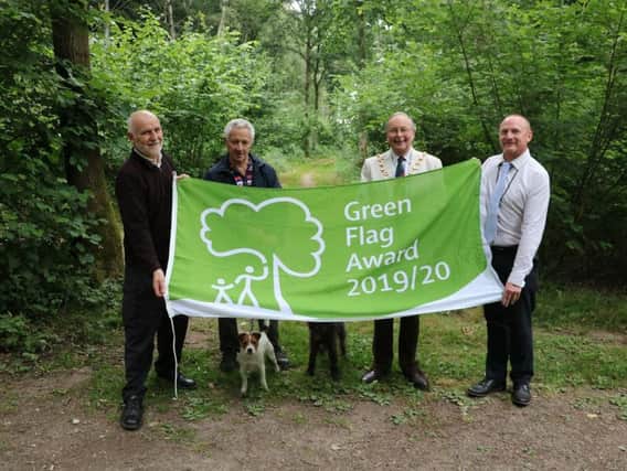 Pictured at Oakley Wood from left to right: Jon Holmes from Warwick District Council, Rod Scott Friends of Oakley Wood, Cllr George Illingworth, Chairman WDC, Simon Richardson from Warwick District Council.