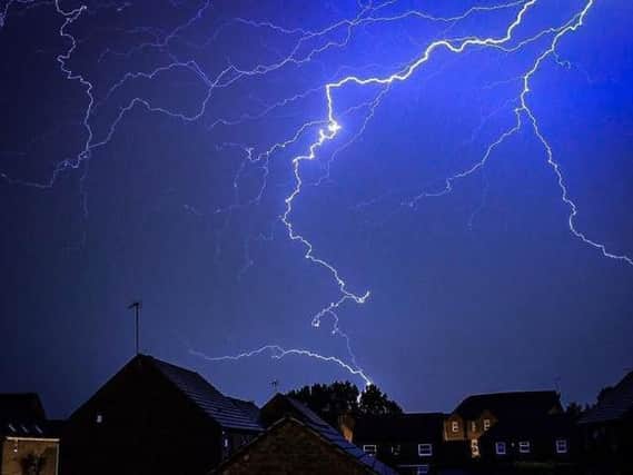 Lightning during last night's thunderstorm. Photo by Paul Middleton