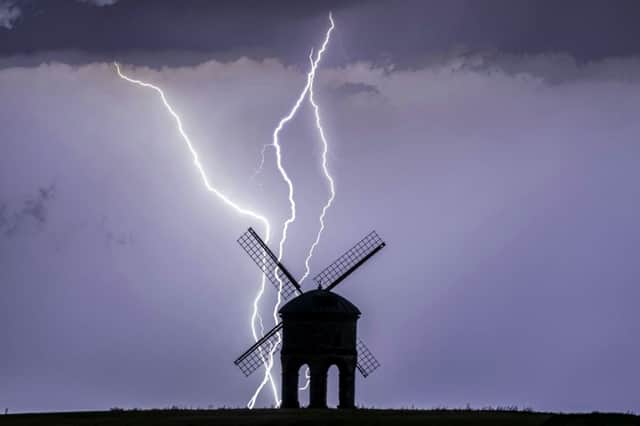 Incredible lightning strike at the 17th century Chesterton Windmill near Leamington Spa, Warks. July 24 2019. See SWNS story SWMDlightning.