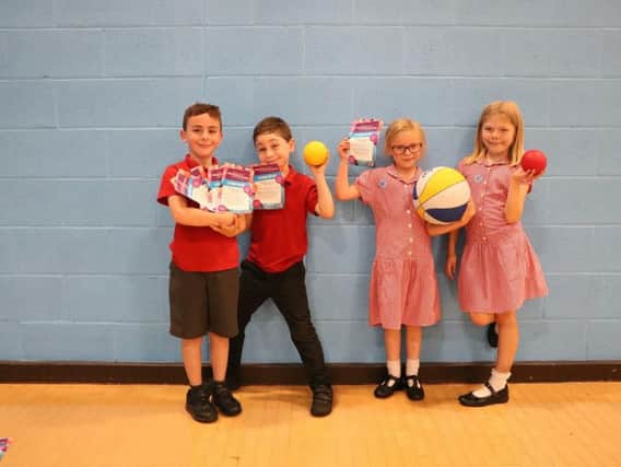 Felix, Olivia, Joseph and Eleanor trying out Commonwealth Games activities at St Nicholas Park Leisure Centre in Warwick. Photo supplied.