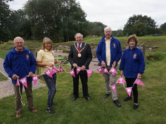 Pictured with the chairman of Warwick District Council Cllr George Illingworth are the custodian of Bagots Castle David Hewer, secretary Delia Whittle, and two of the sites nine volunteers Rheba and Roger Horsfall.