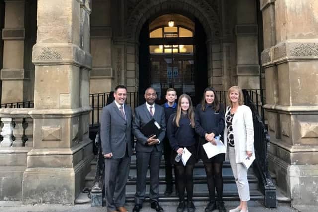 Deputy chair of the Kenilworth Multi Academy Trust and Warwick District Councillor Richard Hales, Headteacher Hayden Abbott and trustee Shirley Whiting join students at Leamington Town Hall where planning permission was approved for the new school and sixth form.