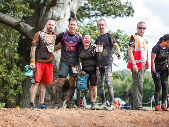 Emma Tysoe wearing the iWalk2.0 with her team at the Wolf Run. Photo by Peachysnaps.