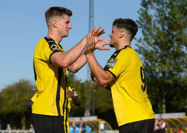 Jack Edwards and Josh March celebrate on Saturday with Brakes seemingly cruising towards the next round.